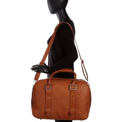 a mannequin holding a brown bag duffel carry on 3137